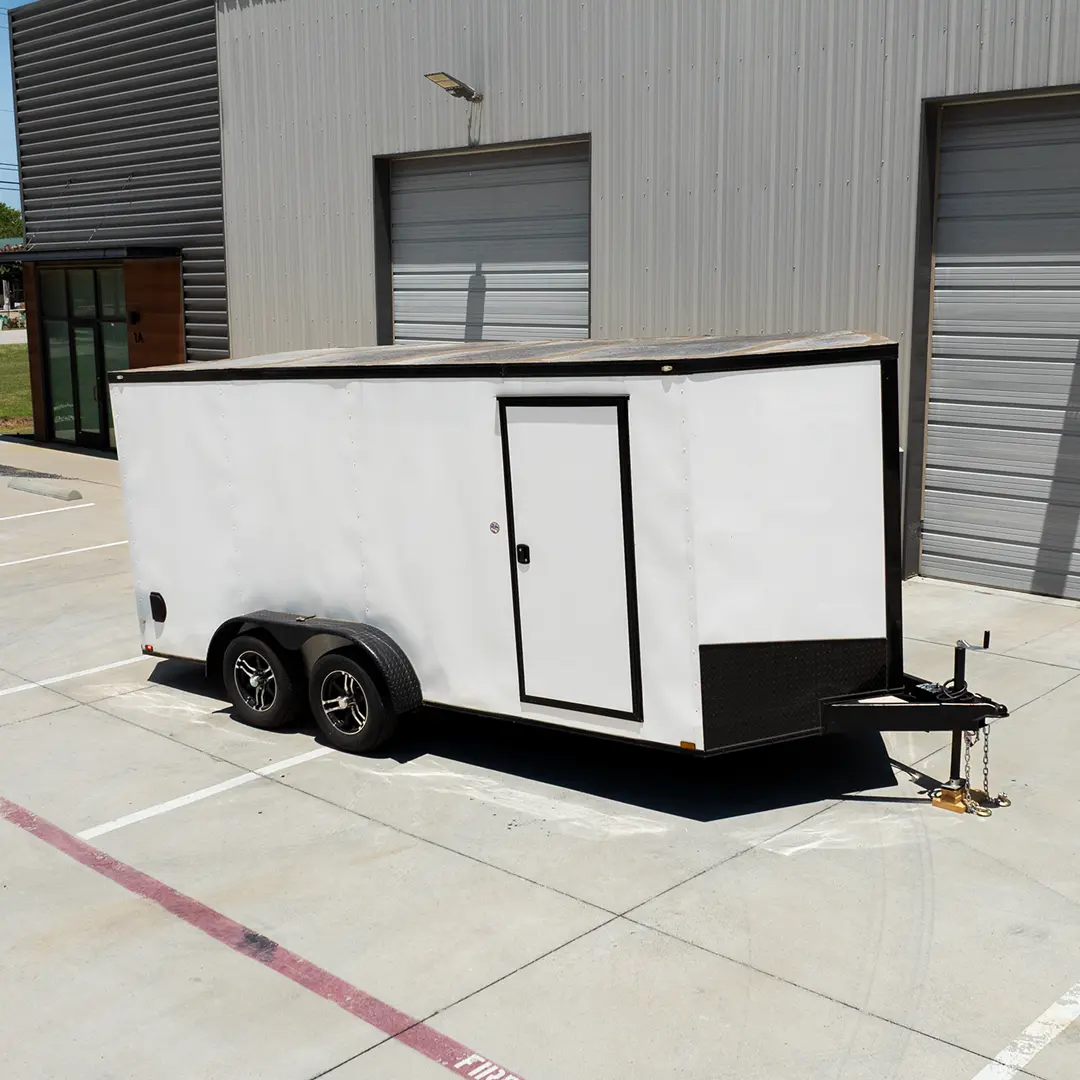 White 7x16 enclosed cargo trailer with side door and tandem axle, for rent at Hitch Please in Krugerville, North Texas